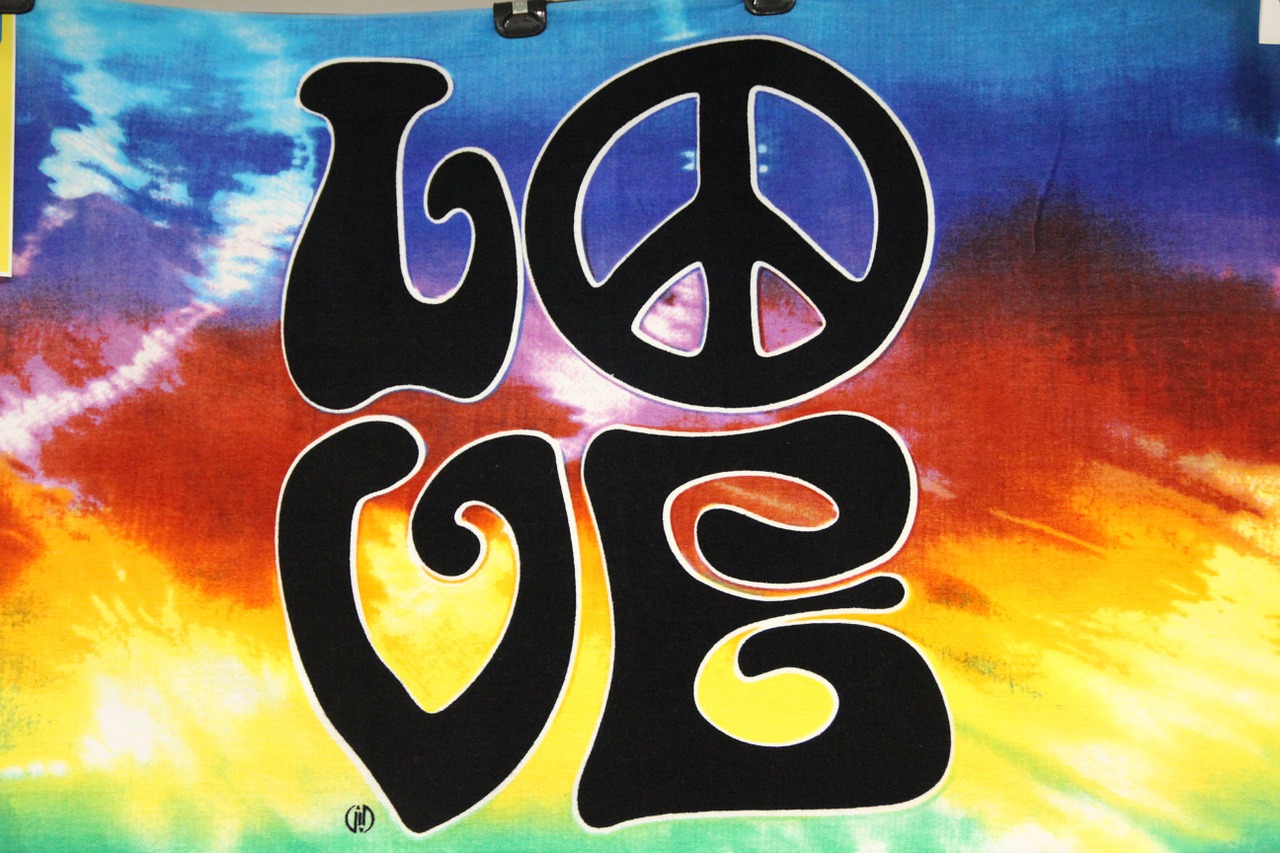 The word "love" in a Woodstock-themed graphic.
