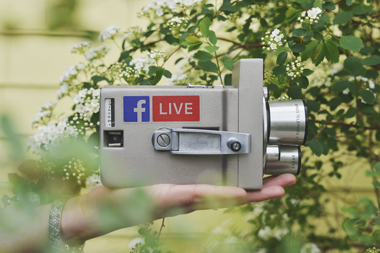 Camcorder with a Facebook Live sticker on it.