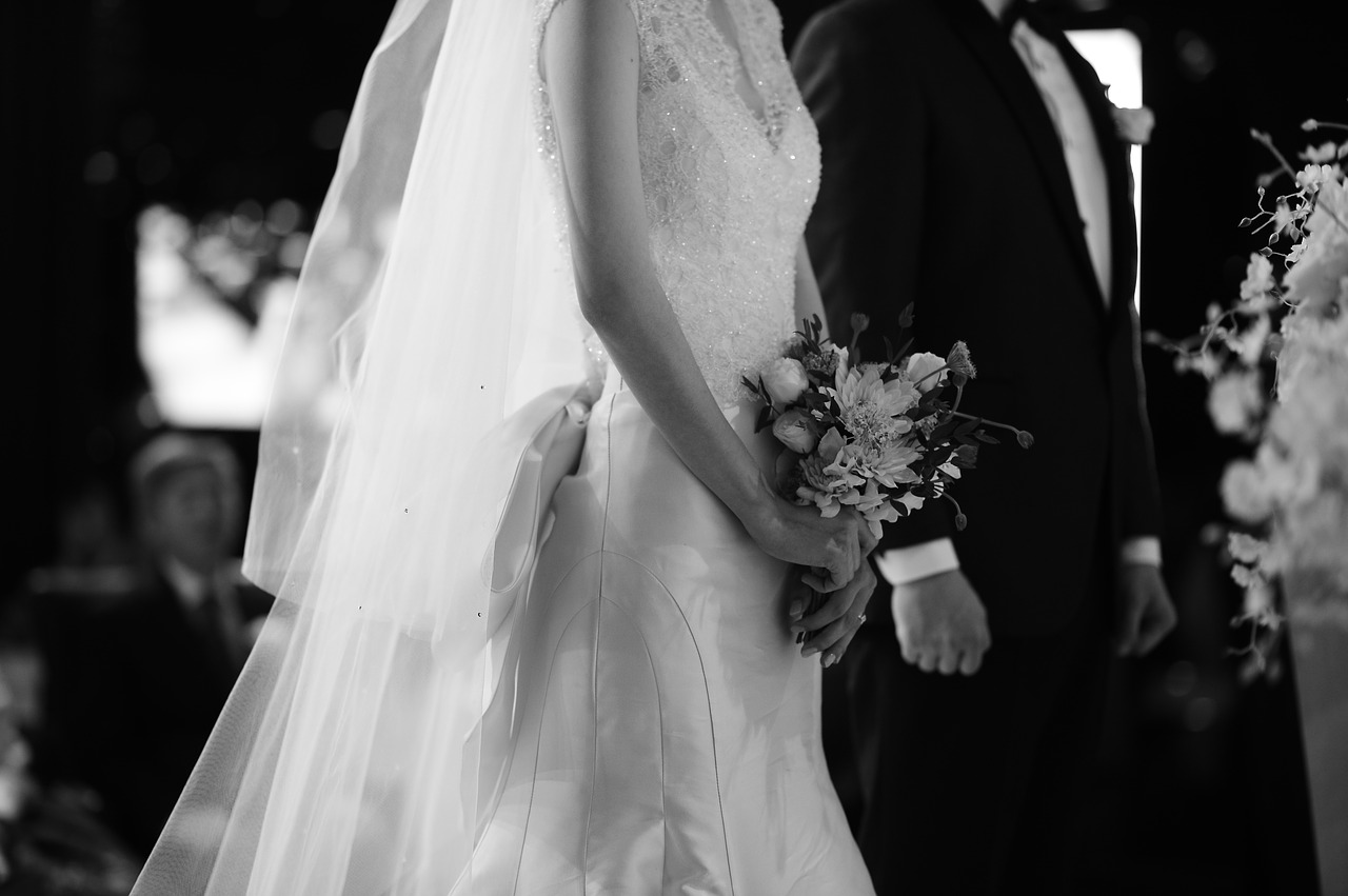 Black and white photo of bride and groom.