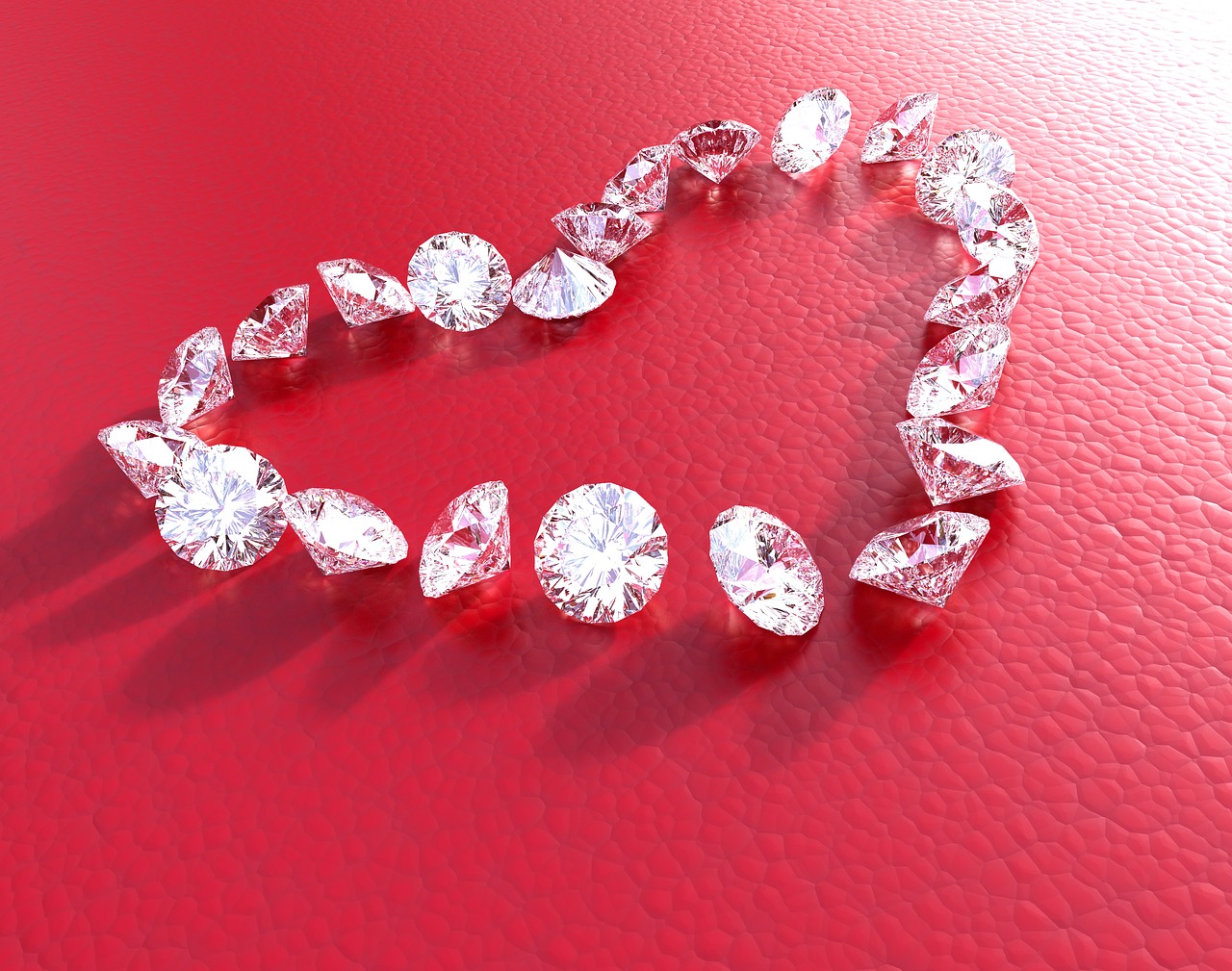 Individual diamonds arranged in the shape of a heart.