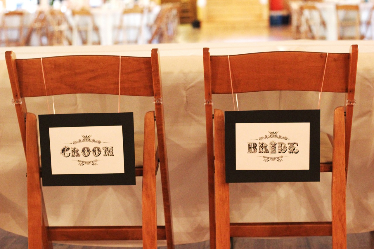 Bride and groom's chairs at reception.