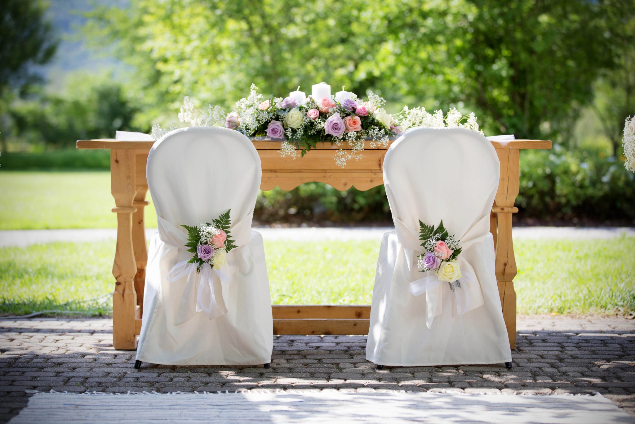 Wedding reception chairs at a table.