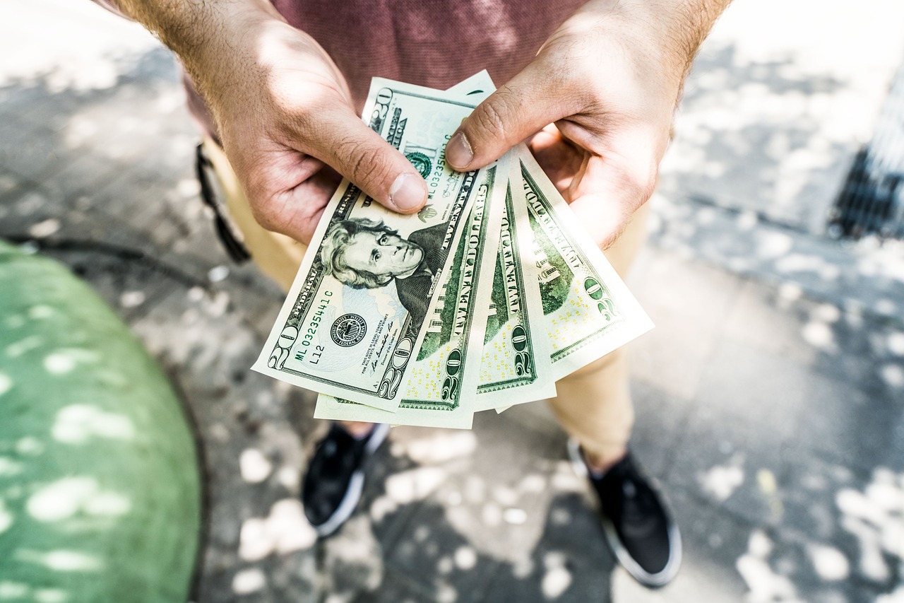Man holding money.