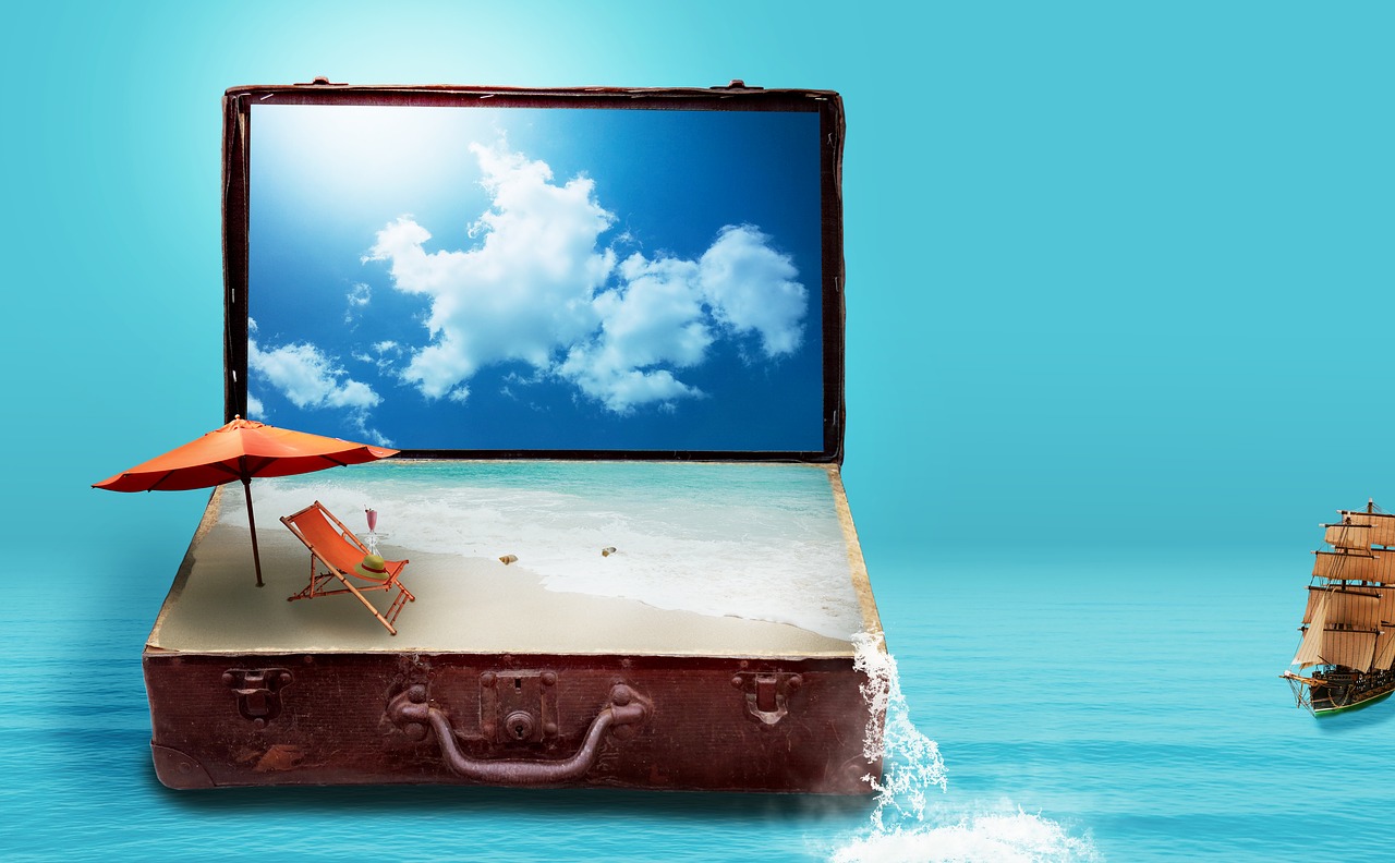 A suitcase with a beach pictured inside of it.