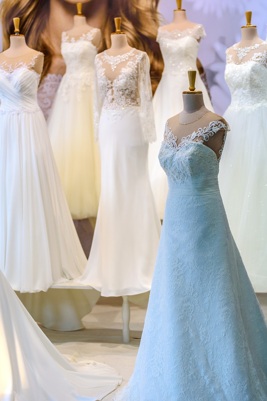 Wedding dresses on mannequins.